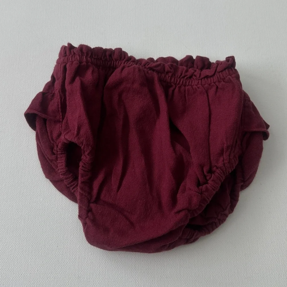April Cornell Size 0-6M and Carter’s baby girl’s bloomers Size 6M.
